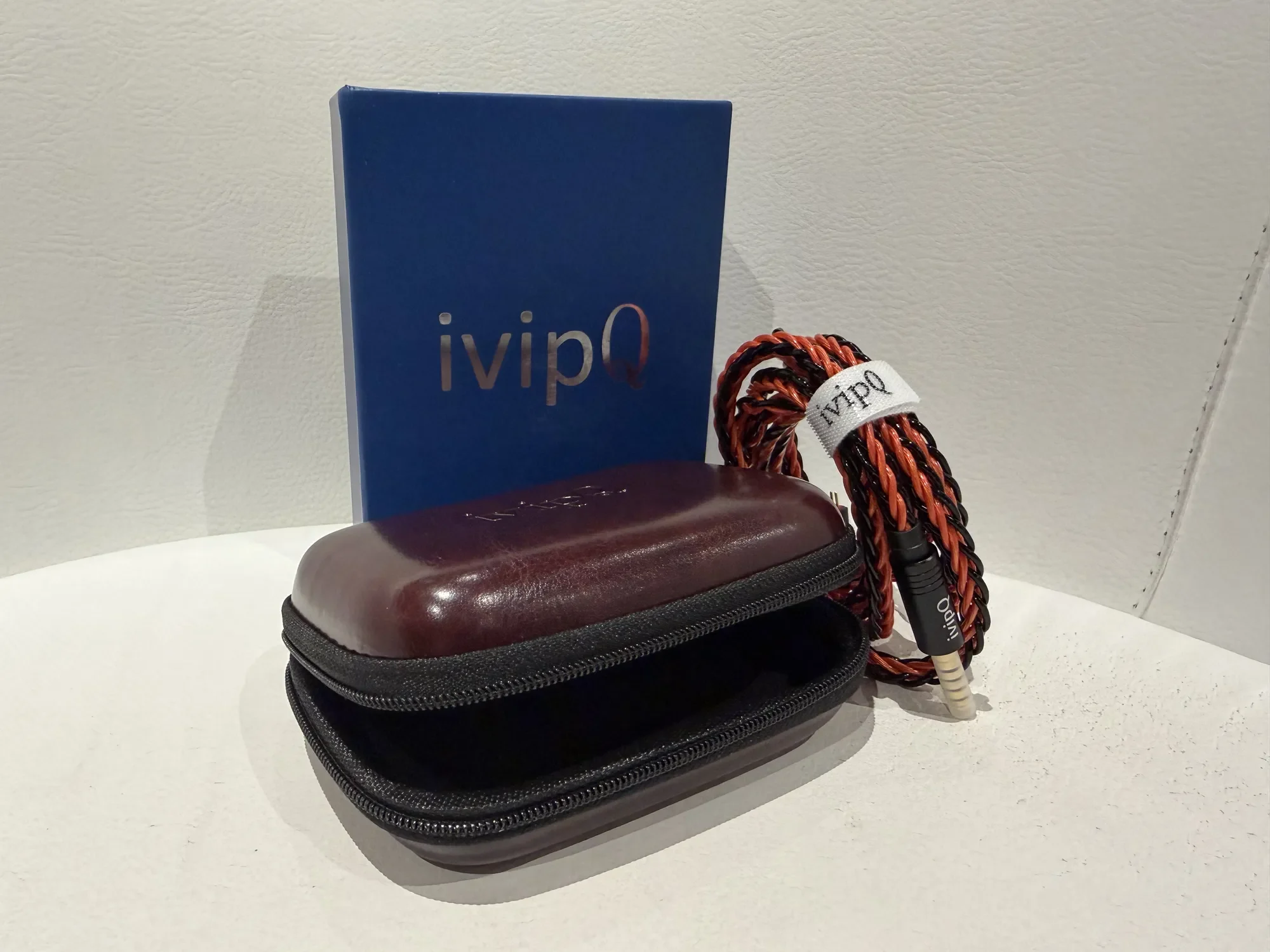 A full unboxing of what the Vulcan packaging looks like. A nice leather case, a blue box, and the cable itself.